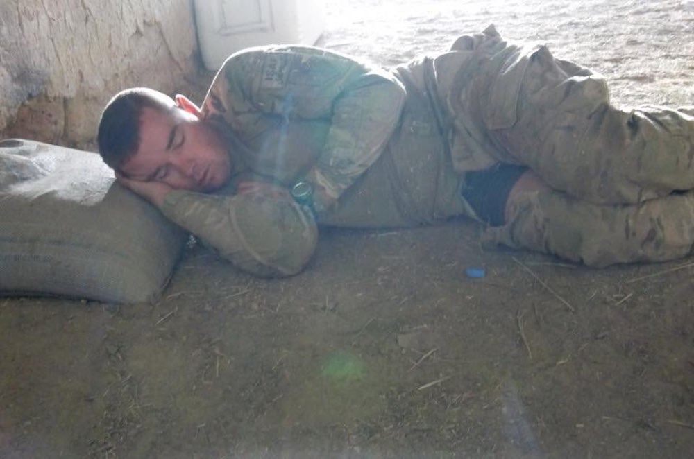 Jason resting during a deployment to Afghanistan